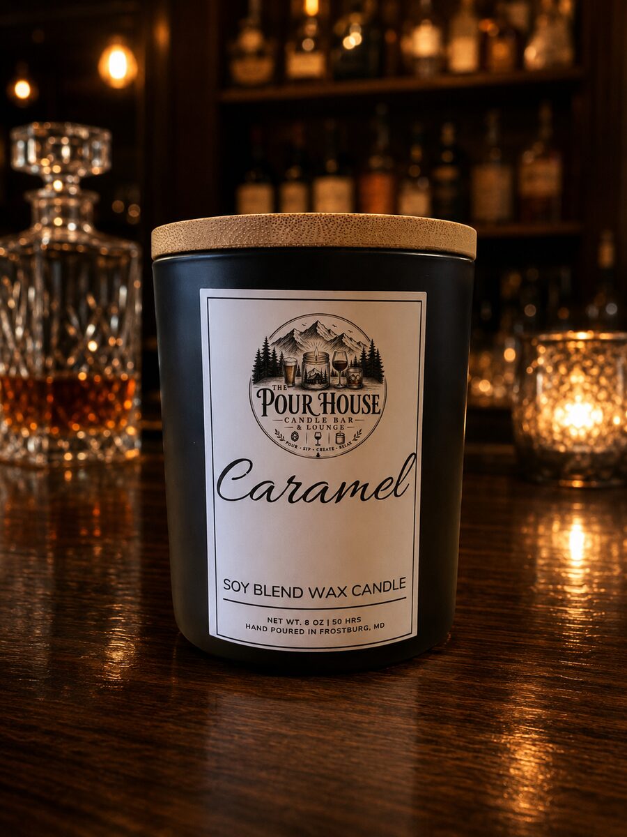 The Pour House Caramel soy candle on the bar
